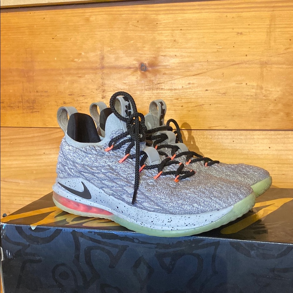 Nike Gray and Black Sneakers with Orange Accents